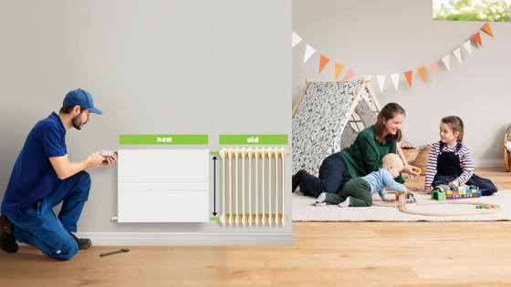 Installer fitting a new flat panel radiator next to an old column radiator in a family home.
