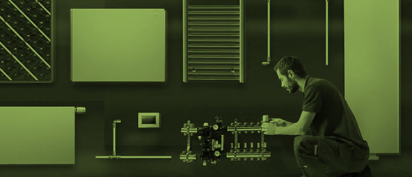 Installer inspecting a heating system